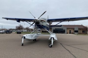 a small airplane sitting on top of a runway